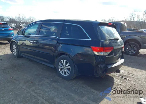 2014 Honda Odyssey Ex-L z USA, uszkodzony, nr VIN 5FNRL5H60EB021136